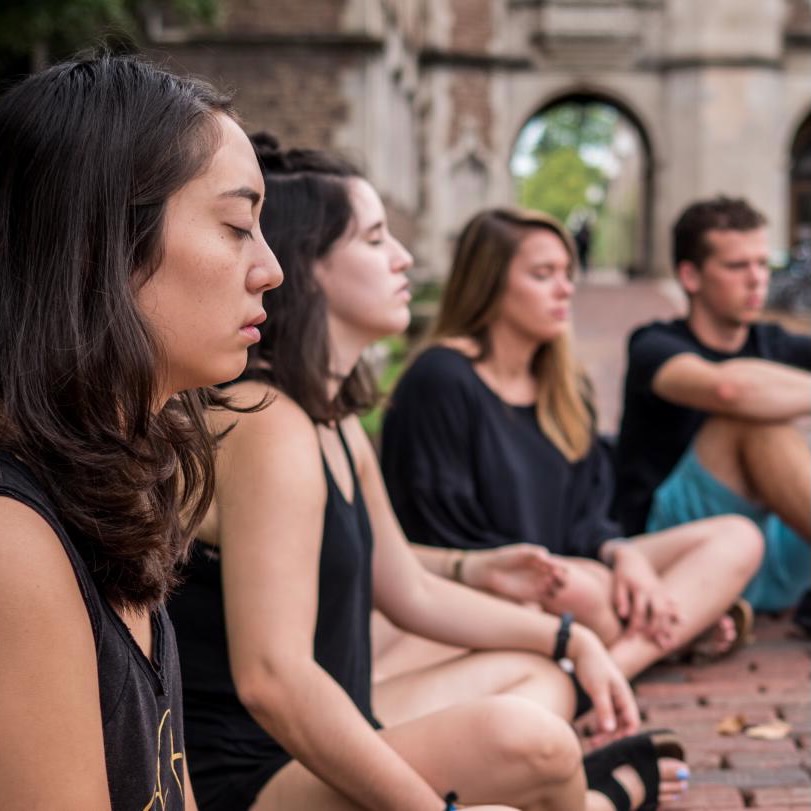 students meditating